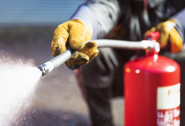 The firefighters had to reach the trapped residents by using hydraulic lifts and by scaling the adjacent building.(Getty Images/iStockphoto) The firefighters had to reach the trapped residents by using hydraulic lifts and by scaling the adjacent building.(Getty Images/iStockphoto)