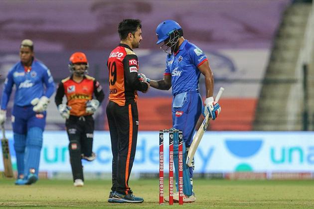 Abu Dhabi: Rashid Khan of Sunrisers Hyderabad and Shikhar Dhawan of Delhi Capitals during Indian Premier League (IPL) cricket match, at Sheikh Zayed Stadium in Abu Dhabi, United Arab Emirates, Sunday, Nov. 8, 2020. (PTI Photo/Sportzpics for BCCI)(PTI08-11-2020_000174B) (PTI)