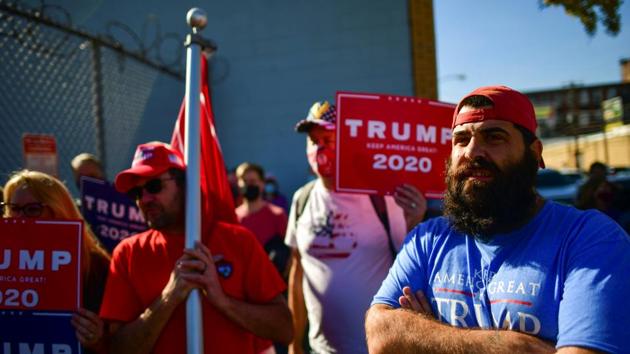 Supporters of President Donald Trump gather outside a news conference from the Trump legal team after news media named Democratic presidential nominee Joe Biden the winner in the 2020 US presidential election, in Philadelphia, Pennsylvania. (Reuters)
