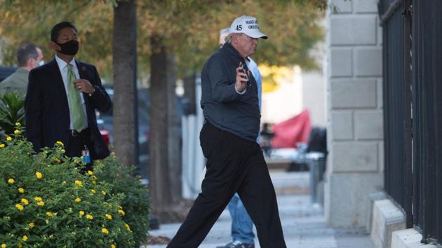 President Donald Trump returns to the White House from playing golf in Washington, DC on November 7, 2020, after Joe Biden was declared the winner of the election. Trump has so far refused to concede the election and announced filing multiple lawsuits against the election results in key battleground states like Pennsylvania. (Andrew Carabello-Reynolds / AFP) President Donald Trump returns to the White House from playing golf in Washington, DC on November 7, 2020, after Joe Biden was declared the winner of the election. Trump has so far refused to concede the election and announced filing multiple lawsuits against the election results in key battleground states like Pennsylvania. (Andrew Carabello-Reynolds / AFP)