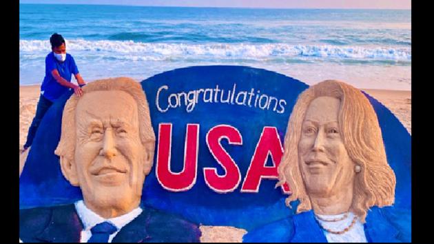 The image shows the 25-foot-long sculpture of Joe Biden and Kamala Harris.(Twitter/@sudarsansand)