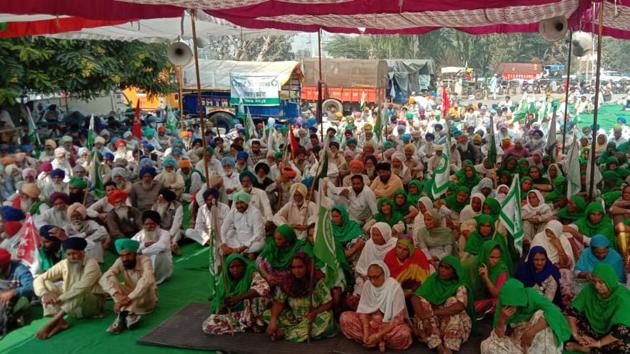 Farmers protest at the parking of the railway station in Sangrur on Monday. (HT PHOTO) Farmers protest at the parking of the railway station in Sangrur on Monday. (HT PHOTO)