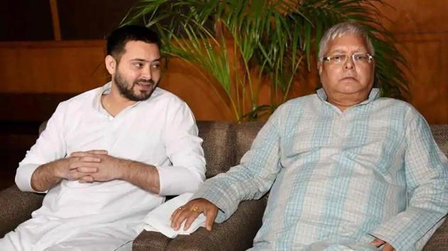 RJD chief Lalu Prasad and his son Tejashwi Prasad Yadav.(PTI file photo)
