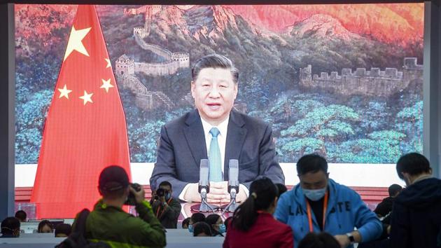A screen shows Chinese President Xi Jinping delivering a speech via video for the opening ceremony of the 3rd China International Import Expo (CIIE) at a media centre in Shanghai on November 4. (AFP) A screen shows Chinese President Xi Jinping delivering a speech via video for the opening ceremony of the 3rd China International Import Expo (CIIE) at a media centre in Shanghai on November 4. (AFP)