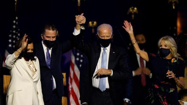 Democratic 2020 US presidential nominee Joe Biden, his wife Jill, his son Hunter Biden and vice presidential nominee Kamala Harris celebrate at their election rally, after the news media announced that Biden has won the 2020 US presidential election over President Donald Trump, in Wilmington, Delaware, US. (Reuters) Democratic 2020 US presidential nominee Joe Biden, his wife Jill, his son Hunter Biden and vice presidential nominee Kamala Harris celebrate at their election rally, after the news media announced that Biden has won the 2020 US presidential election over President Donald Trump, in Wilmington, Delaware, US. (Reuters)