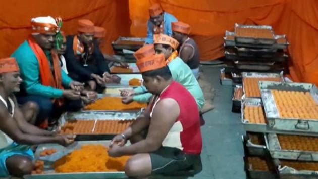 BJP workers in Patna Sahib constituency prepare sweets for distribution, ahead of the counting for Bihar Assembly Elections, in Patna on Monday. (ANI Photo) BJP workers in Patna Sahib constituency prepare sweets for distribution, ahead of the counting for Bihar Assembly Elections, in Patna on Monday. (ANI Photo)