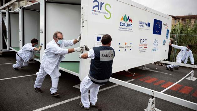 Health workers install the new mobile field hospital on November, 9 in Toulouse, France, as part of the fight against the Covid-19. Europe, with about 12 million cases, is the worst-affected region at the moment, overtaking Latin America. Europe accounts for 24% of COVID-19 deaths and is logging about 1 million new infections every three days or so, according to a Reuters analysis. That is 51% of the global total. (Lionel Bonaventure / AFP)