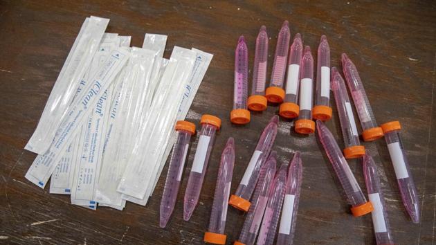 Test swabs and specimen tubes sit on a table at a Covid-19 testing site at the Abyssinian Baptist Church in the Harlem neighborhood of New York.(AP File Photo)