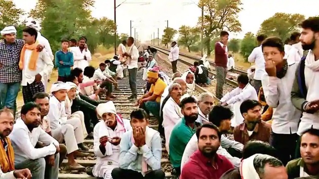 Protesters lock a railway track in Rajasthan’s Bharatpur to press their demand for reservation for Gurjars.(ANI) Protesters lock a railway track in Rajasthan’s Bharatpur to press their demand for reservation for Gurjars.(ANI)