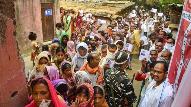Voters stand in long queues to cast their votes at a polling station during the second phase of Assembly elections. The counting of the votes will take place today and the results will be announced.(PTI) Voters stand in long queues to cast their votes at a polling station during the second phase of Assembly elections. The counting of the votes will take place today and the results will be announced.(PTI)