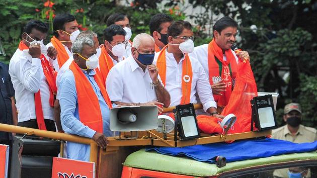 Karnataka Chief minister BS Yediyurappa during an election campaign in support of BJP candidate from RR Nagar constituency Munirathna Naidu (R), at Srinivas Nagar in Bengaluru.(PTI) Karnataka Chief minister BS Yediyurappa during an election campaign in support of BJP candidate from RR Nagar constituency Munirathna Naidu (R), at Srinivas Nagar in Bengaluru.(PTI)