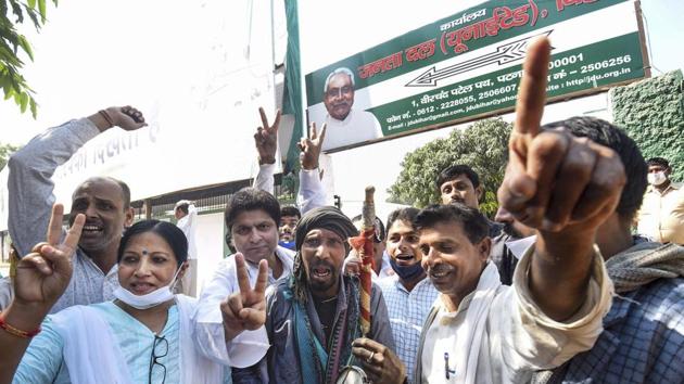 Janata Dal (United) supporters react outside a centre in Patna where counting of votes in the Bihar Assembly polls is under way. (PTI) Janata Dal (United) supporters react outside a centre in Patna where counting of votes in the Bihar Assembly polls is under way. (PTI)