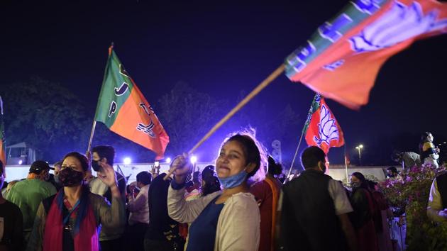 New Delhi, India - Nov. 10, 2020: BJP supporters in a celebratory mood after counting for the Bihar assembly election showed leads for the NDA, at the party headquarters in New Delhi, India, on Tuesday, November 10, 2020. (Photo by Arvind Yadav/ Hindustan Times) (Arvind Yadav/HT PHOTO) New Delhi, India - Nov. 10, 2020: BJP supporters in a celebratory mood after counting for the Bihar assembly election showed leads for the NDA, at the party headquarters in New Delhi, India, on Tuesday, November 10, 2020. (Photo by Arvind Yadav/ Hindustan Times) (Arvind Yadav/HT PHOTO)