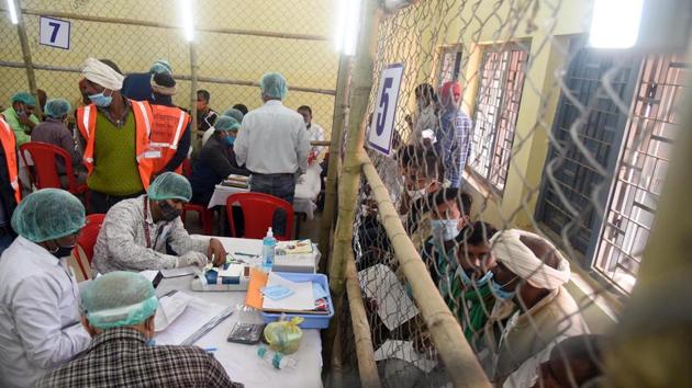 Election officials carry out the counting of votes for Bihar Assembly election, at a centre in Patna on Tuesday. (ANI Photo) Election officials carry out the counting of votes for Bihar Assembly election, at a centre in Patna on Tuesday. (ANI Photo)