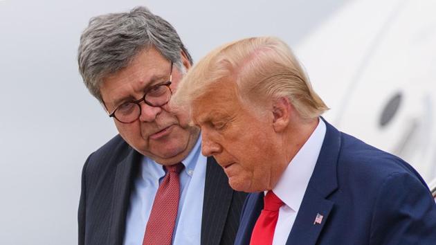 A file photo taken on September 1 showing US President Donald Trump and US Attorney General William Barr.(AFP)