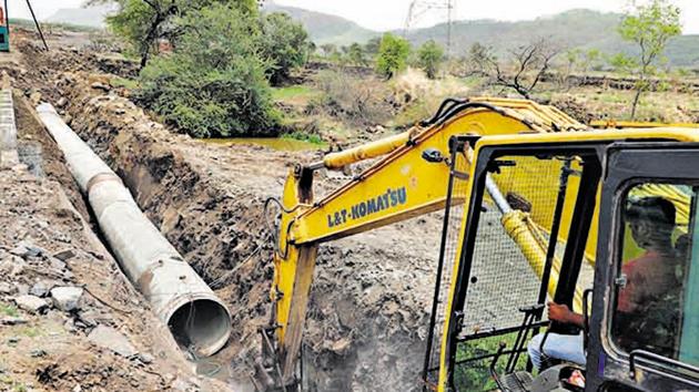 The Bhama Askhed dam water supply project, to lay a 42-km pipeline from the dam to Pune, was initiated in February 2014.(HT PHOTO)