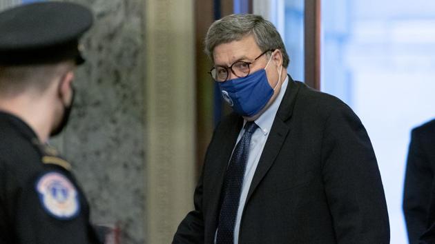 William Barr, US attorney general, wears a protective mask while arriving at the US Capitol in Washington, DC, US, on Monday, Nov. 9, 2020.(Bloomberg)