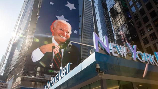 An image of U.S. President-elect Joe Biden on a screen in the Times Square area of New York,. (Bloomberg) An image of U.S. President-elect Joe Biden on a screen in the Times Square area of New York,. (Bloomberg)