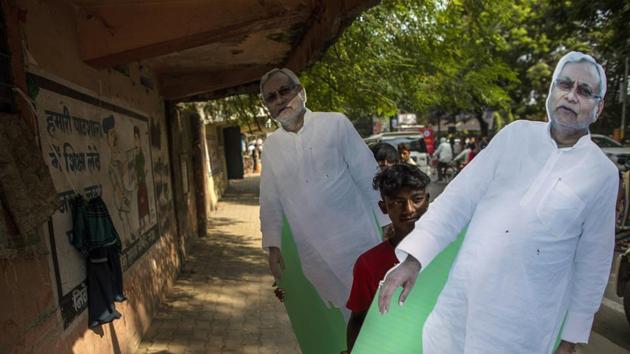Supporters carry a cardboard cut-out of Bihar chief minister Nitish Kumar in Gaya.(Bloomberg File Photo) Supporters carry a cardboard cut-out of Bihar chief minister Nitish Kumar in Gaya.(Bloomberg File Photo)