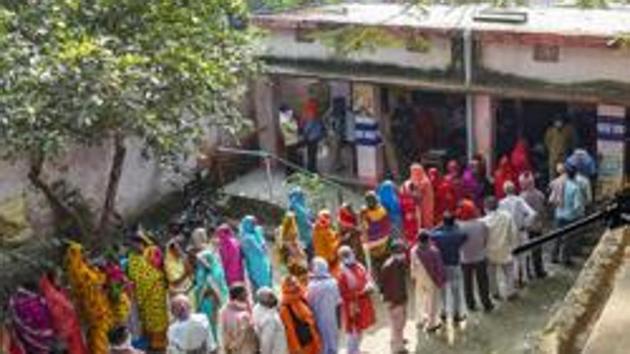 Bihar Election Results 2020: Voters standing in the queue to cast their votes, at a polling booth, during the 3rd phase of the Bihar Assembly Election(PTI) Bihar Election Results 2020: Voters standing in the queue to cast their votes, at a polling booth, during the 3rd phase of the Bihar Assembly Election(PTI)