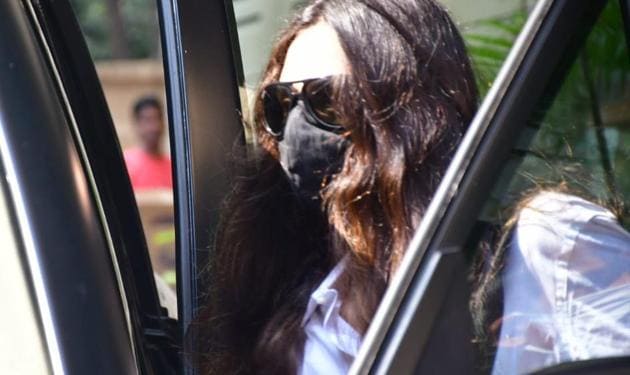 Arjun Rampal’s girlfriend Gabriella Demetriades leaving for the NCB office on Wednesday morning.(Varinder Chawla)