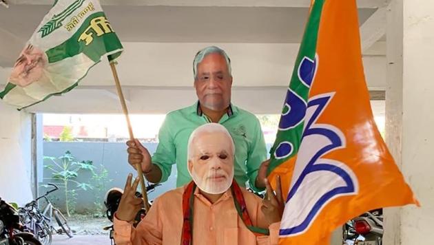 NDA supporters wearing masks of CM Nitish Kumar and PM Narendra Modi celebrate the alliance's leads on counting day of Bihar Assembly polls, in Patna, Bihar on Tuesday November 10, 2020. (Photo by Santosh Kumar/ Hindustan Times) NDA supporters wearing masks of CM Nitish Kumar and PM Narendra Modi celebrate the alliance's leads on counting day of Bihar Assembly polls, in Patna, Bihar on Tuesday November 10, 2020. (Photo by Santosh Kumar/ Hindustan Times)