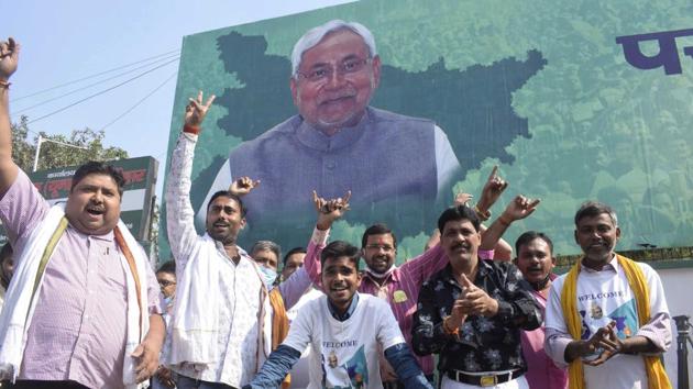 Supporters of the Janata Dal (United) celebrate the Bihar assembly poll results in Patna on Tuesday.(AP) Supporters of the Janata Dal (United) celebrate the Bihar assembly poll results in Patna on Tuesday.(AP)