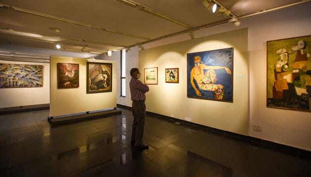 A visitor looks at the paintings inside National Gallery of Modern Art after it re-opened amid coronavirus outbreak, in New Delhi, India, on Tuesday, November 10, 2020. (Amal KS/HT PHOTO) A visitor looks at the paintings inside National Gallery of Modern Art after it re-opened amid coronavirus outbreak, in New Delhi, India, on Tuesday, November 10, 2020. (Amal KS/HT PHOTO)