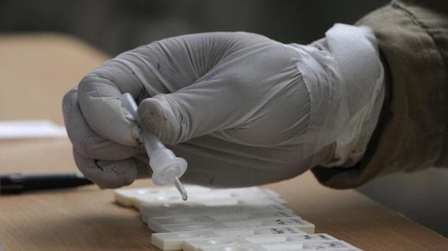 Additional testing showed the virus was destroyed in similar times on cotton from face masks(File Photo) Additional testing showed the virus was destroyed in similar times on cotton from face masks(File Photo)