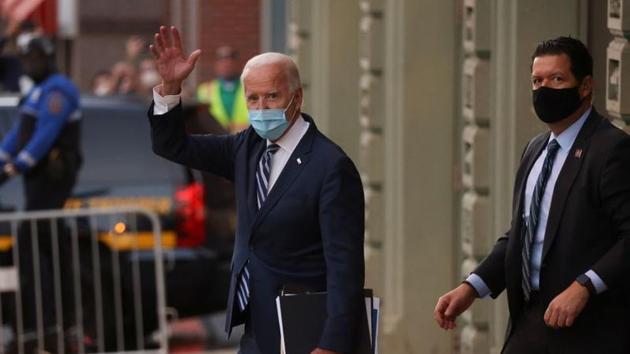 US President-elect Joe Biden departs after spending the day at the theater serving as his transition headquarters in Wilmington, Delaware. (Reuters) US President-elect Joe Biden departs after spending the day at the theater serving as his transition headquarters in Wilmington, Delaware. (Reuters)