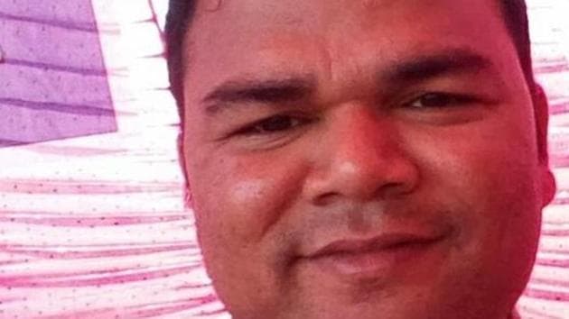 Police officer Prakash Kumar Karna who has been asked to pay ₹2.5 lak each to two men falsely implicated in a case by him. (HT Photo) Police officer Prakash Kumar Karna who has been asked to pay ₹2.5 lak each to two men falsely implicated in a case by him. (HT Photo)