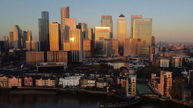 UK has recorded more than 50,000 deaths due to Covid-19. An aerial view of London's Canary Wharf financial district as the sun rises over the River Thames in London. (AFP) UK has recorded more than 50,000 deaths due to Covid-19. An aerial view of London's Canary Wharf financial district as the sun rises over the River Thames in London. (AFP)