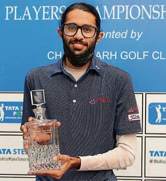 Karandeep Kochhar with his trophy at the Chandigarh Golf Club on Thursday.