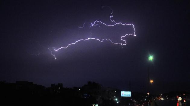 Lightning seen in the night sky during rain in Delhi.(ANI)