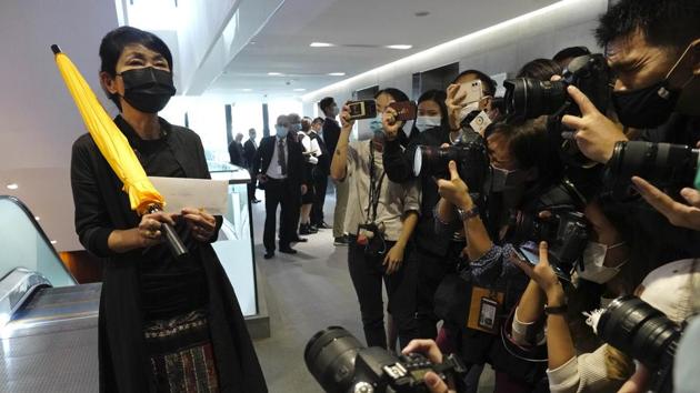 Pro-democracy legislator Mao Mengjing before handing her resignation letter to Legislative Council in Hong Kong on November 12. (AP) Pro-democracy legislator Mao Mengjing before handing her resignation letter to Legislative Council in Hong Kong on November 12. (AP)