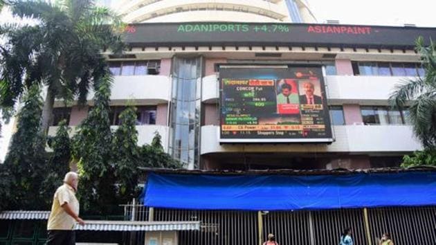 A digital screen on the facade of the Bombay Stock Exchange (BSE) building displays stock prices. (PTI File Photo) A digital screen on the facade of the Bombay Stock Exchange (BSE) building displays stock prices. (PTI File Photo)