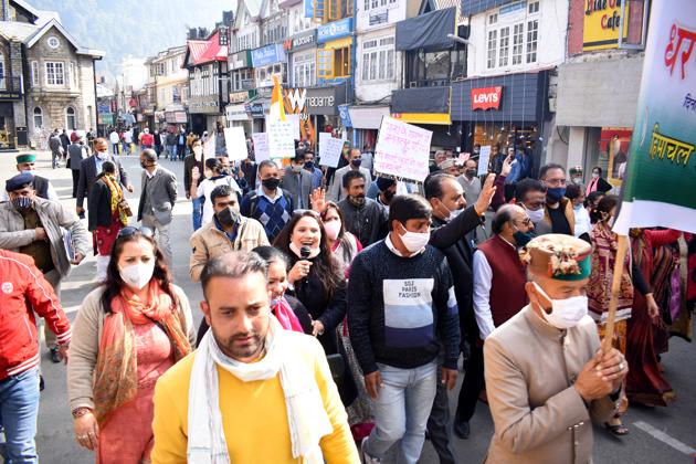 Congress workers during a rally at Mall Road against rising inflation. (Deepak Sansta/HT) Congress workers during a rally at Mall Road against rising inflation. (Deepak Sansta/HT)