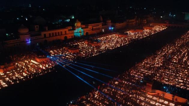 The banks of river Saryu lit up with earthen lamps (diyas) during Deepotsav celebrations on the eve of Diwali in Ayodhya on Friday.(HT PHOTO)