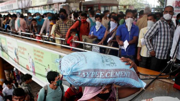 Migrants who returned from their hometown of Uttar Pradesh arrive to wait in line to be tested for the coronavirus disease (COVID-19) during a rapid antigen testing campaign at a railway station, on the outskirts of Mumbai.(REUTERS File) Migrants who returned from their hometown of Uttar Pradesh arrive to wait in line to be tested for the coronavirus disease (COVID-19) during a rapid antigen testing campaign at a railway station, on the outskirts of Mumbai.(REUTERS File)