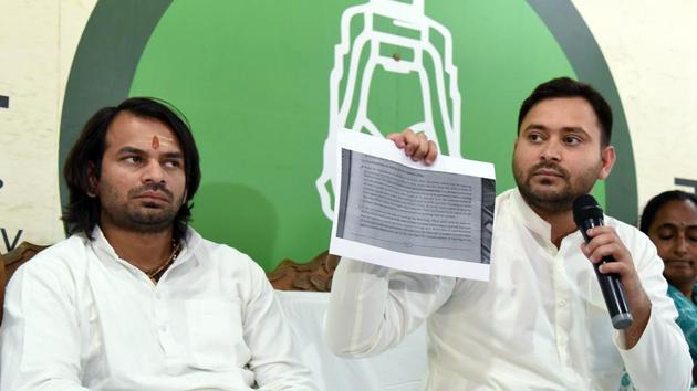 RJD leader Tejashwi Yadav along with his brother and party leader Tej Pratap Yadav during a press conference in Patna on Thursday.(ANI) RJD leader Tejashwi Yadav along with his brother and party leader Tej Pratap Yadav during a press conference in Patna on Thursday.(ANI)