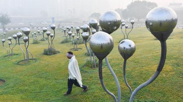 A man out in the early hours of the morning near AIIMS in New Delhi on November 10. However, despite the unfavourable weather conditions that prevail this time of the year, SAFAR has forecasted the AQI to be better this year, as compared to Diwali day and the days after the festival over the past four years. (Sanchit Khanna / HT Photo) A man out in the early hours of the morning near AIIMS in New Delhi on November 10. However, despite the unfavourable weather conditions that prevail this time of the year, SAFAR has forecasted the AQI to be better this year, as compared to Diwali day and the days after the festival over the past four years. (Sanchit Khanna / HT Photo)