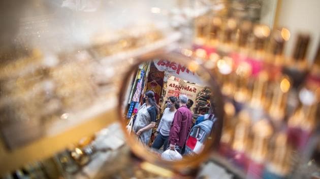 Shoppers out on Dhanteras are reflected in a mirror, at Lajpat Nagar market in New Delhi on November 13. SAFAR’s forecast added that even if residents do not burn any crackers –the capital in under a total ban on the sale and use any kind of firecrackers –the PM 2.5 level is still expected to be on the higher-end of “very poor” or the lower-end of “severe” category. (Prashanth Vishwanthan / Bloomberg) Shoppers out on Dhanteras are reflected in a mirror, at Lajpat Nagar market in New Delhi on November 13. SAFAR’s forecast added that even if residents do not burn any crackers –the capital in under a total ban on the sale and use any kind of firecrackers –the PM 2.5 level is still expected to be on the higher-end of “very poor” or the lower-end of “severe” category. (Prashanth Vishwanthan / Bloomberg)