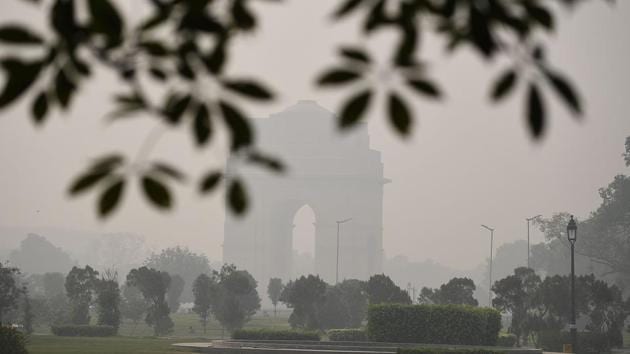 A view of India Gate on a hazy morning in New Delhi on November 9. Delhi, on November 11, recorded over 8,500 new coronavirus disease (Covid-19) cases in a single day for the first time since the pandemic broke out. (Sajjad Hussain / AFP)