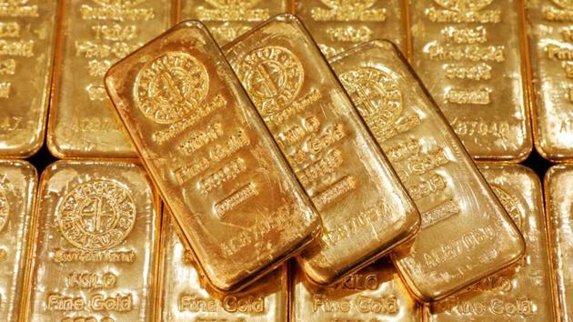 US gold futures gained 0.2 per cent to USD 1,876.50.(REUTERS)