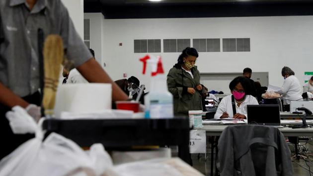 Votes being counted at the TCF Center the day after the 2020 US presidential election, in Detroit, Michigan, US on November 4, 2020.(Reuters Photo)
