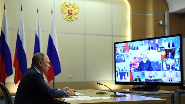 Russian President Vladimir Putin attends a summit of leaders of the Shanghai Cooperation Organisation (SCO) via a video conference call in Sochi, Russia.(via REUTERS) Russian President Vladimir Putin attends a summit of leaders of the Shanghai Cooperation Organisation (SCO) via a video conference call in Sochi, Russia.(via REUTERS)