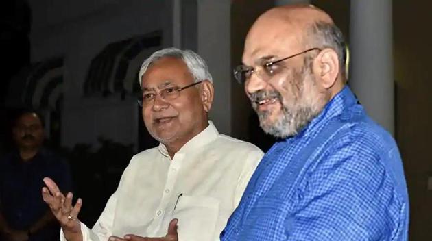 JD(U) chief Nitish Kumar with BJP leader Amit Shah(File photo)