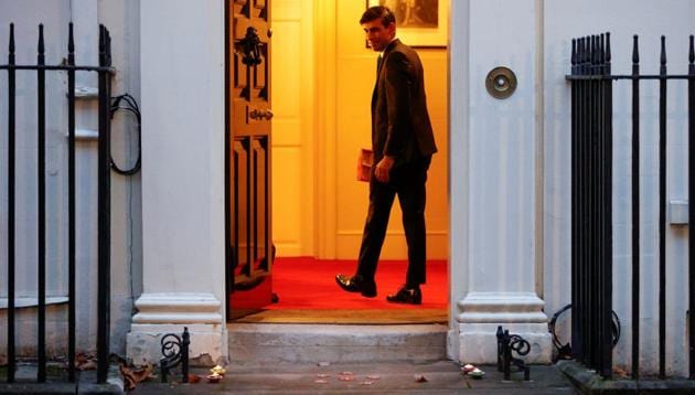 Britain's Chancellor of the Exchequer Rishi Sunak enters Downing Street after lighting candles ahead of Diwali, in London.(REUTERS) Britain's Chancellor of the Exchequer Rishi Sunak enters Downing Street after lighting candles ahead of Diwali, in London.(REUTERS)