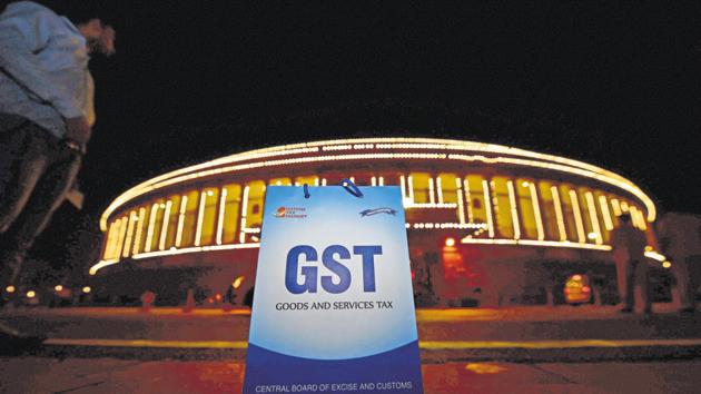 An illuminated Parliament ahead of the midnight launch of Goods and Services Tax (GST) in New Delhi in 2017.(PTI FILE)