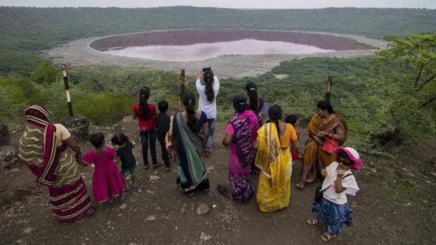 The lake had made news in August when the water in the circular-shaped lake turned pink. The phenomenon was caused by salt-loving Haloarchaea microbes which lead to pigmentation, according to a report by Agharkar Research Institute (ARI) in Pune, an autonomous body under the department of Science and Technology.(Pratik Chorge/ Hindustan Times)